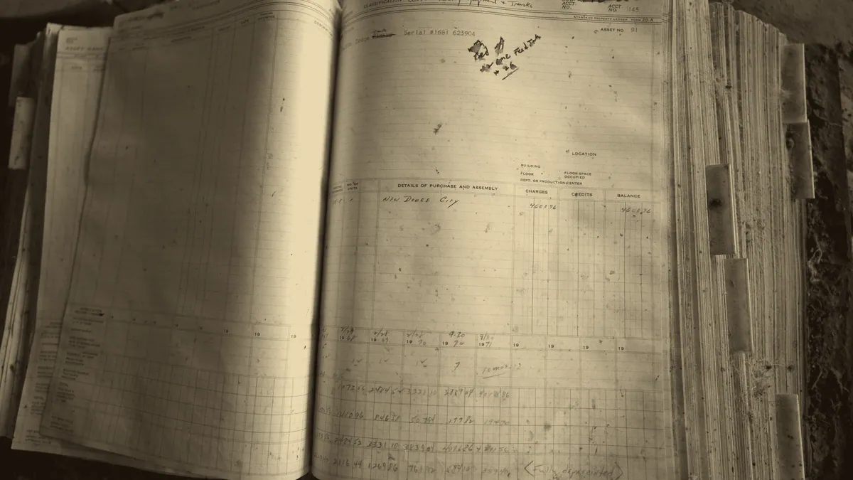 An old ledger, columns of entries by hand.