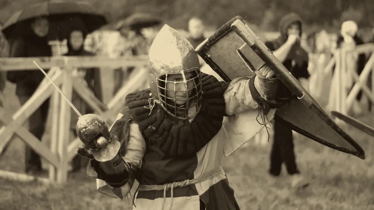 A sword and shield laid out for inspection.